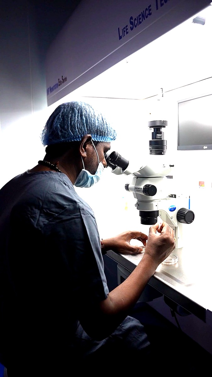 Embryologist working in IVF lab Mother Hospitals